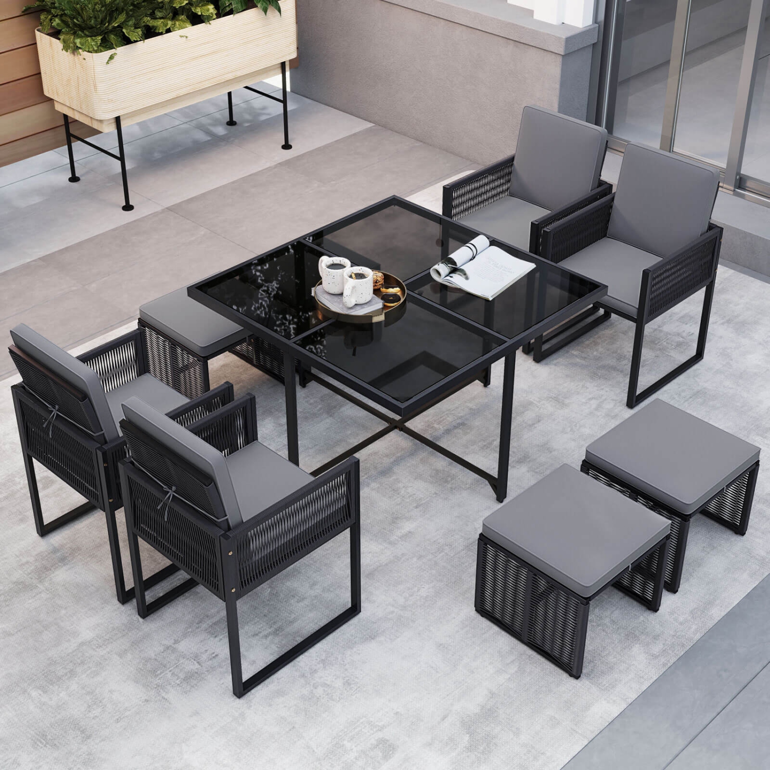 Ensemble de salle à manger de patio 9 PCS de Costway avec chaises en rotin de PE Table en verre trempé et poufs