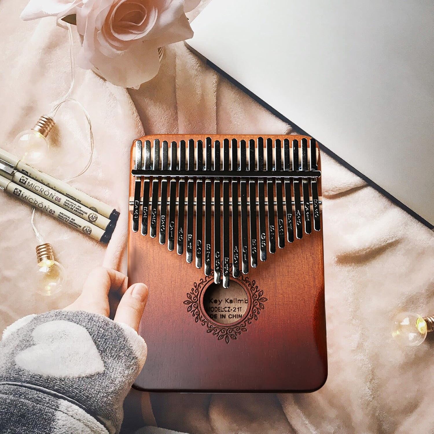 Portable 21-key thumb piano - hand-carved wooden kalimba with musical notes, suitable for children and adult beginners, is an ideal musical