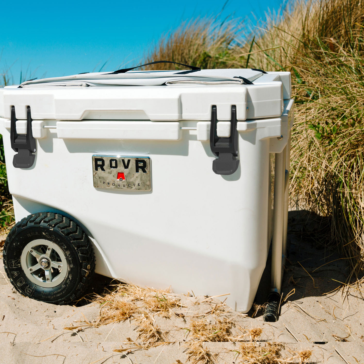 RovR RollR 56.8 L Hard Shell Sided Wheeled Cooler with Handle - Powder