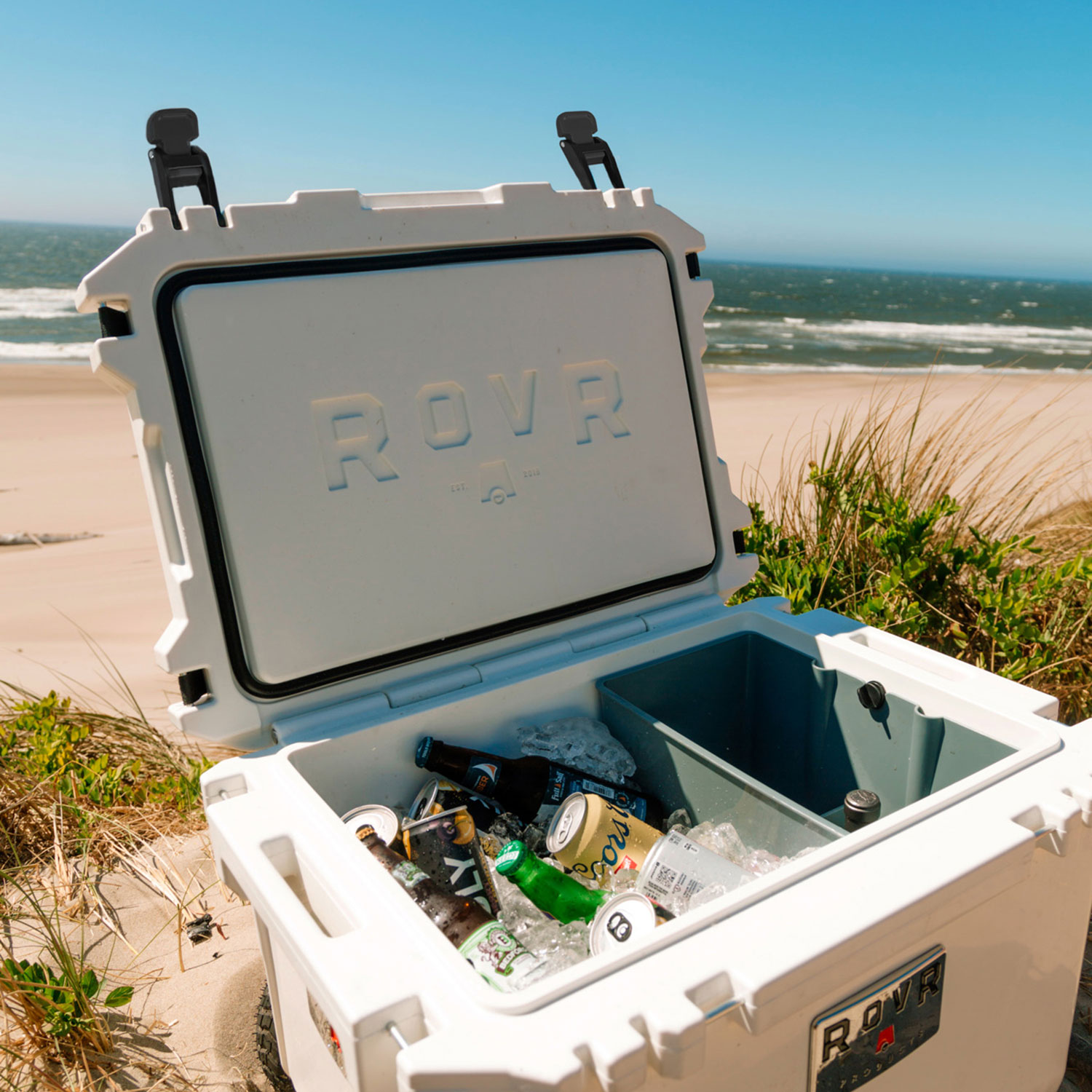 RovR RollR 56.8 L Hard Shell Sided Wheeled Cooler with Handle - Powder