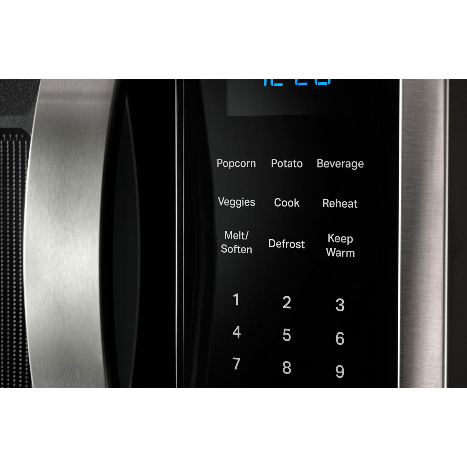 Four à micro-ondes à hotte intégrée de Whirlpool - 1,9 pi³ - Acier inoxydable