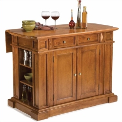 HOMESTYLES Americana Wood Kitchen Island In In Brown