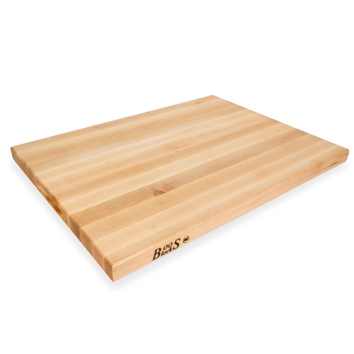 JOHN BOOS Boosblock Maple Edge Grain Cutting Board, 18" X 24" - 1-1/2" Thick I am so used to my smaller plastic cutting boards that I forgot what a real wooden cutting board was like