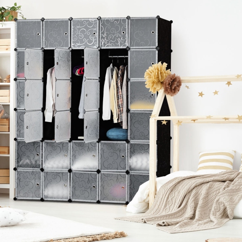Ce meuble de rangement portatif à 30 cubes avec portes pour garde-robe de Costway vous permet de ranger vos vêtements