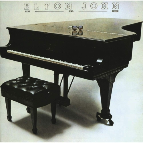 Image 1 de 1.. Elton John: Ici et là