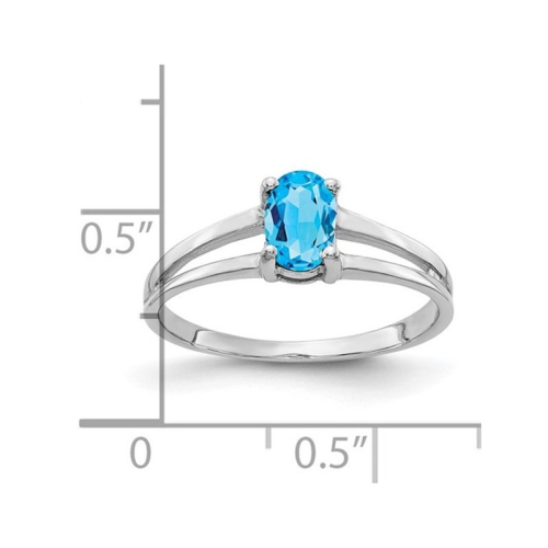 Bague en or blanc 14 ct avec topaze bleue solitaire 1/2 ct