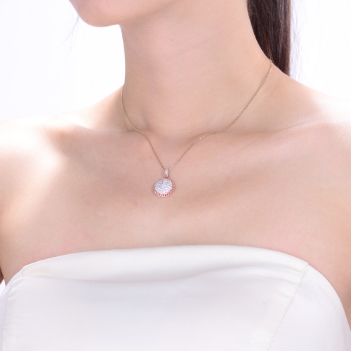 Pendentif rond en or rose cz