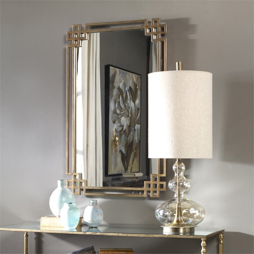 Bowery Hill Metal Framed Glass Mirror in Antique Gold Finish