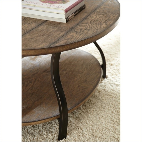 Bowery Hill Oval Cocktail Table in Light Oak Finish