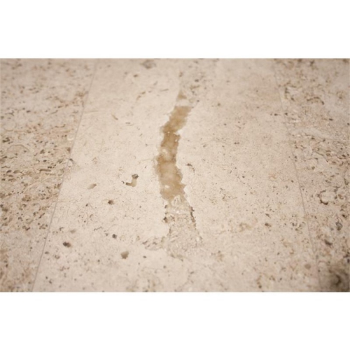 Bowery Hill Contemporary Round Stone Top Coffee Table in Alabaster Travertine