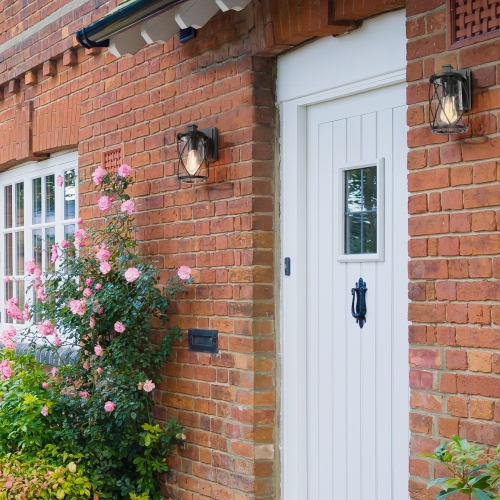 Farmhouse Drum Outdoor Wall Sconce Light, 1-Light Matte Black Industrial Outdoor Cage Wall Lantern with Clear Glass Shade