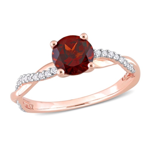 Bague en or rose 14 ct avec diamants et grenat rond de 1.30 ct