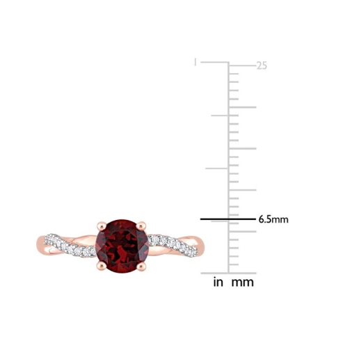 Bague en or rose 14 ct avec diamants et grenat rond de 1.30 ct