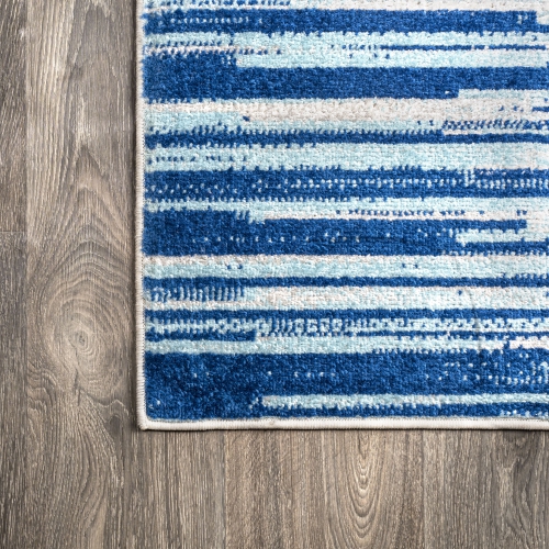 Tapis d'appoint linéaire moderne à demi-rayures