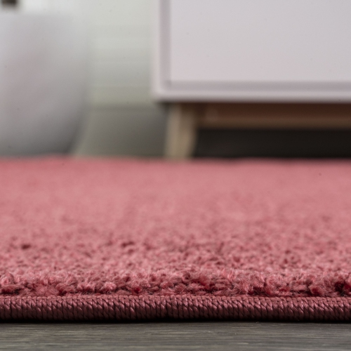 Haze Solid Low Pile Area Rug Red