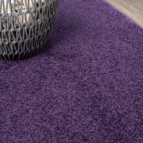 Haze Solid Low Pile Area Rug Purple