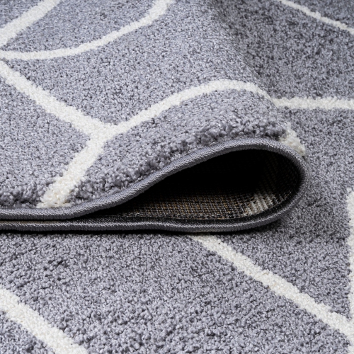 Tapis moderne à motif géométrique culbutant