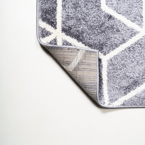 Tapis moderne à motif géométrique culbutant