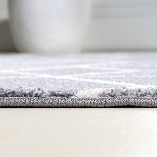 Tapis moderne à motif géométrique culbutant