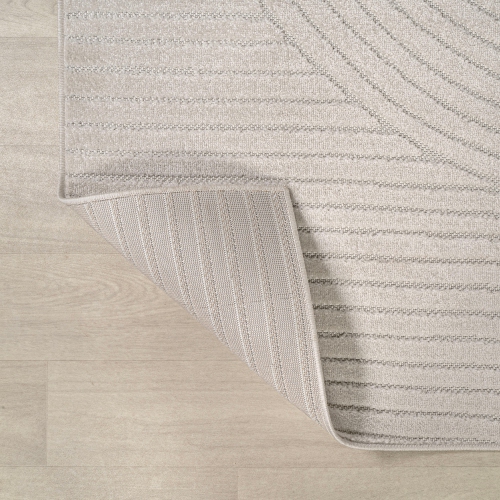 Tapis à motif géométrique courbé minimaliste de Skagen