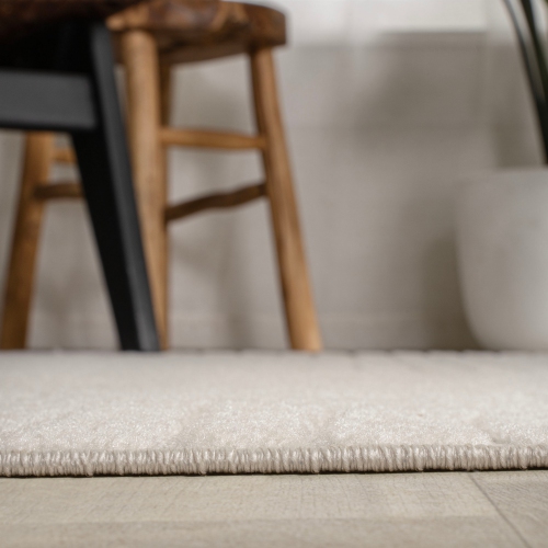 Tapis à motif géométrique courbé minimaliste de Skagen