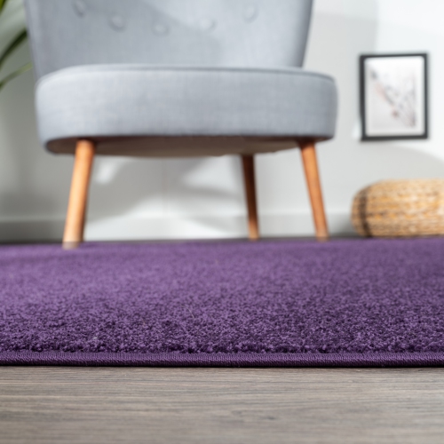 Haze Solid Low Pile Area Rug Purple
