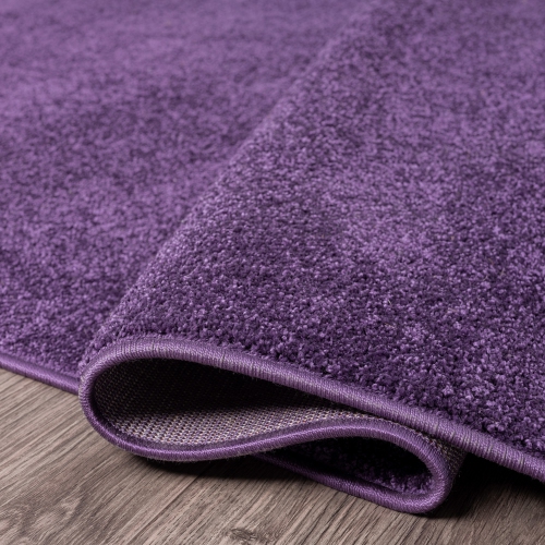 Haze Solid Low Pile Area Rug Purple
