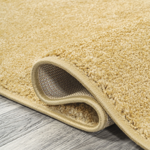 Haze Solid Low Pile Area Rug Mustard