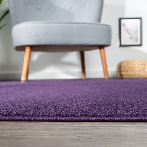 Haze Solid Low Pile Area Rug Purple