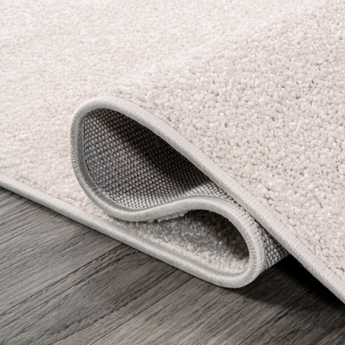 Haze Solid Low Pile Area Rug Ivory