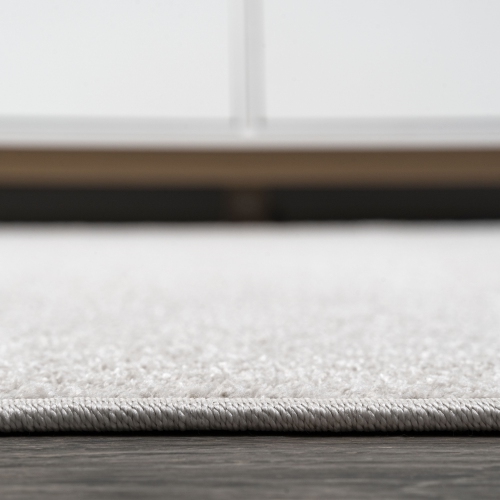 Haze Solid Low Pile Area Rug Ivory