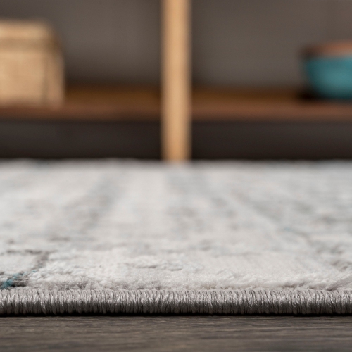 Tapis ancien treillis délavé