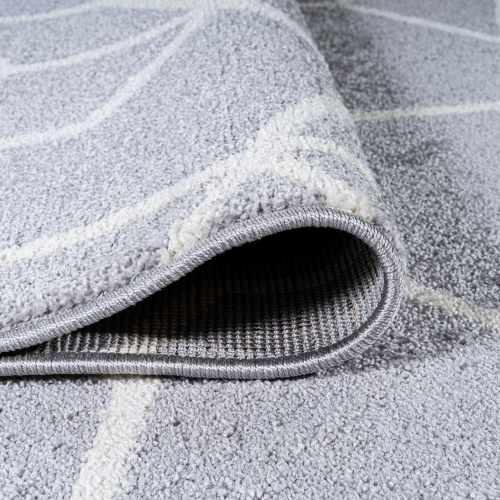 Tapis moderne à motif géométrique culbutant