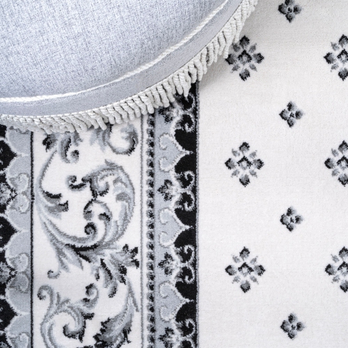 Carpette Acanthus à bordure française