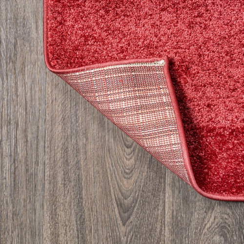 Haze Solid Low Pile Area Rug Red