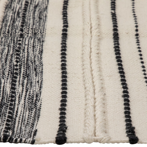 3.5' x 2.25' Cream and Black Twisted Textured Handloom Woven Outdoor Throw Rug