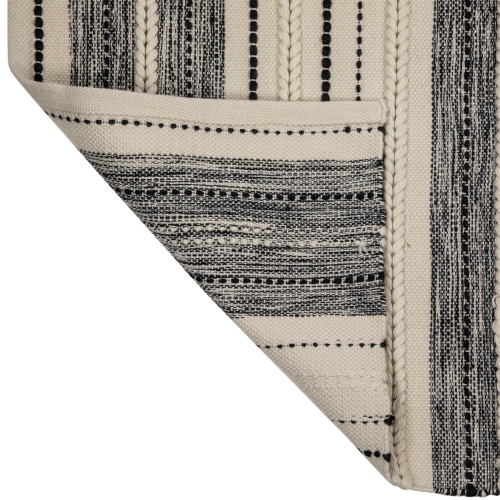 3.5' x 2.25' Cream and Black Twisted Textured Handloom Woven Outdoor Throw Rug