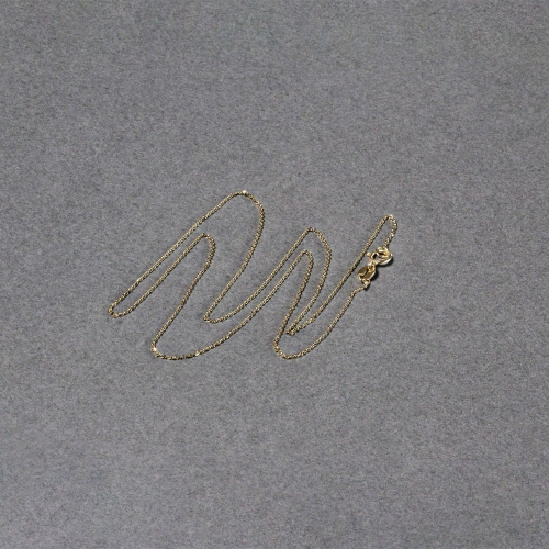 Chaîne 0,7 mm en or jaune 14K ct à maillons coupés au diamant