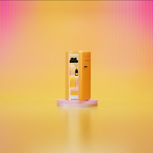 Réfrigérateur à congélateur supérieur de 24 po 9,9 pi³ avec éclairage DEL Veuve Clicquot de Smeg - Orange