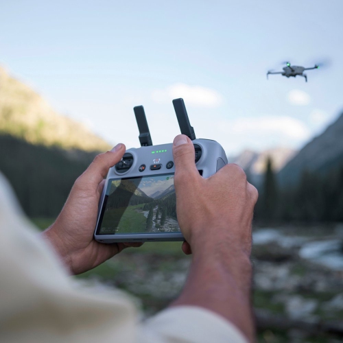 DJI Mini 4 Pro Drone and RC 2 Remote Control with Built-in Screen - Gray by DJI - Open Box condition - Image 4