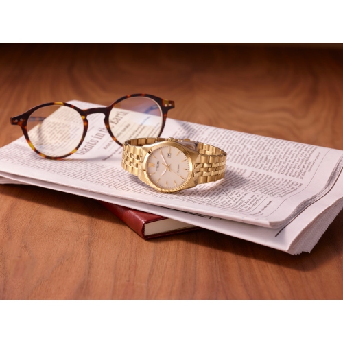 Montre pour hommes Corso Eco-Drive 40 mm de Citizen avec boîtier et bracelet en acier inoxydable doré et cadran champagne