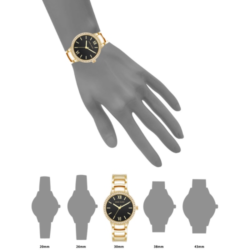 Montre ronde pour femmes 30 mm dorée avec cadran noir et lunette sertie de cristaux d'Anne Klein