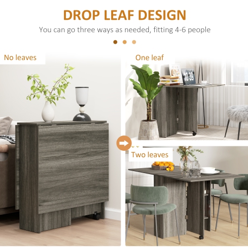 Table pliante de HOMCOM, table à abattant pour petits espaces avec 2 tablettes, petite table de cuisine avec roulettes, grain de bois gris