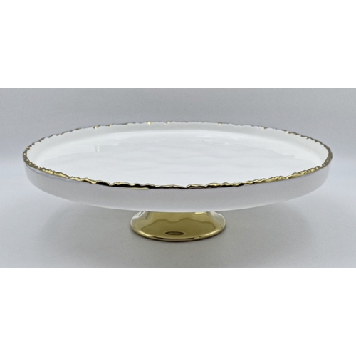Assiette à gâteau ronde en porcelaine blanche à bordure dorée et support de la collection Simplicity