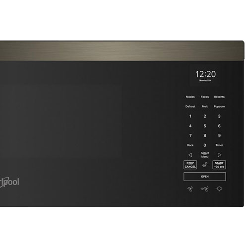 Four à micro-ondes à hotte intégrée de Whirlpool - 1,1 pi³ - Fini en acier inoxydable noir