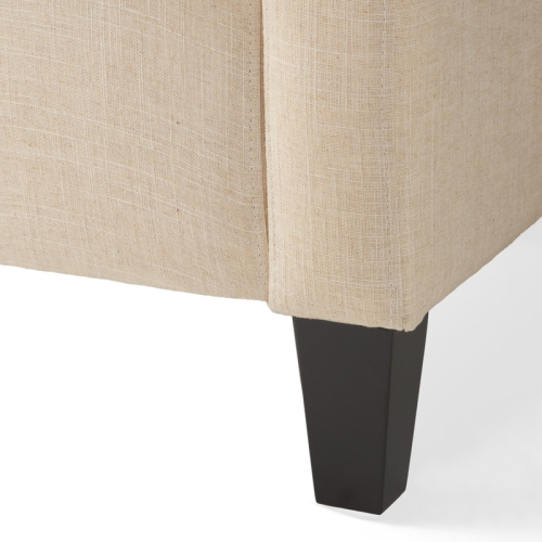 Stylists – Fauteuil en tissu capitonné et repose-pieds