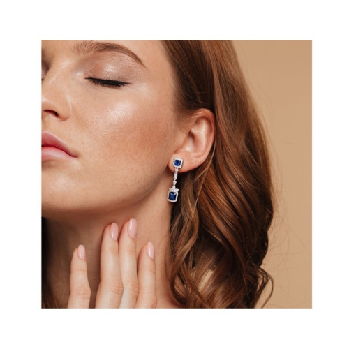 1.00 Carat Diamond and 2.54 Carat (ctw) Blue Sapphire Dangle Earrings in 14K White Gold