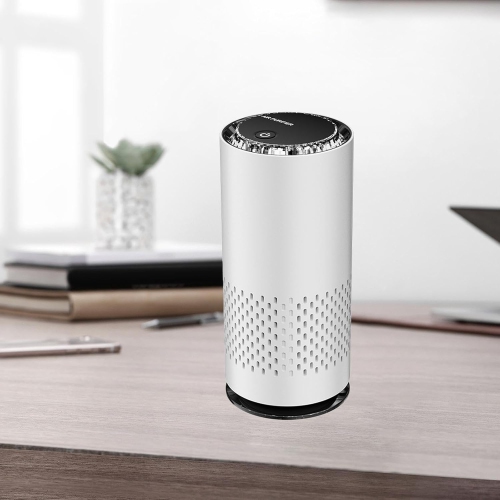 Mini air purifier plug and play compact low noise with colored light air purifier suitable for car, office and bedroom,