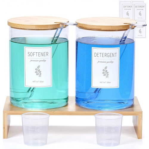 Image 1 de 5.. KitHero Laundry Detergent Dispenser with Bamboo Lids, Shelf Stand, Scoops, 8 Waterproof Labels, 2 Measuring Cups - 2-Pack 120 oz Glass Containers for