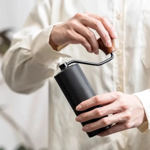 Moulin à grains de café à trois niveaux à manivelle à la main Moulin à café à broyage à la main Moulin à café manuel sept étoiles